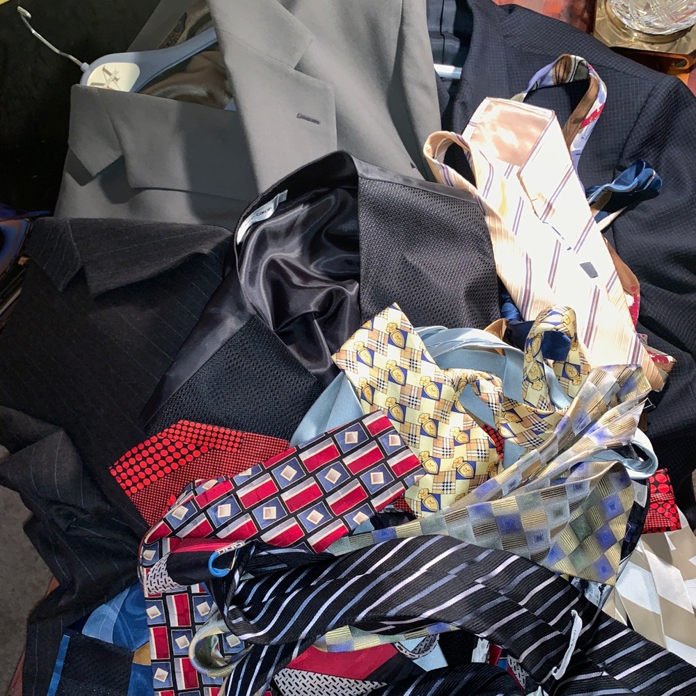 3 suit jackets, 1 vest, 14 ties.